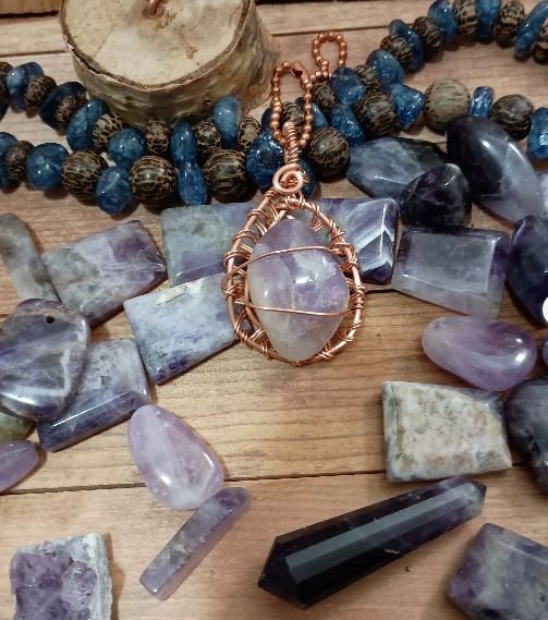 Amethyst and copper pendant by 3704 Jewelry Creations designed to support calm energy, spiritual balance, and mindful adornment through handcrafted wire jewelry.