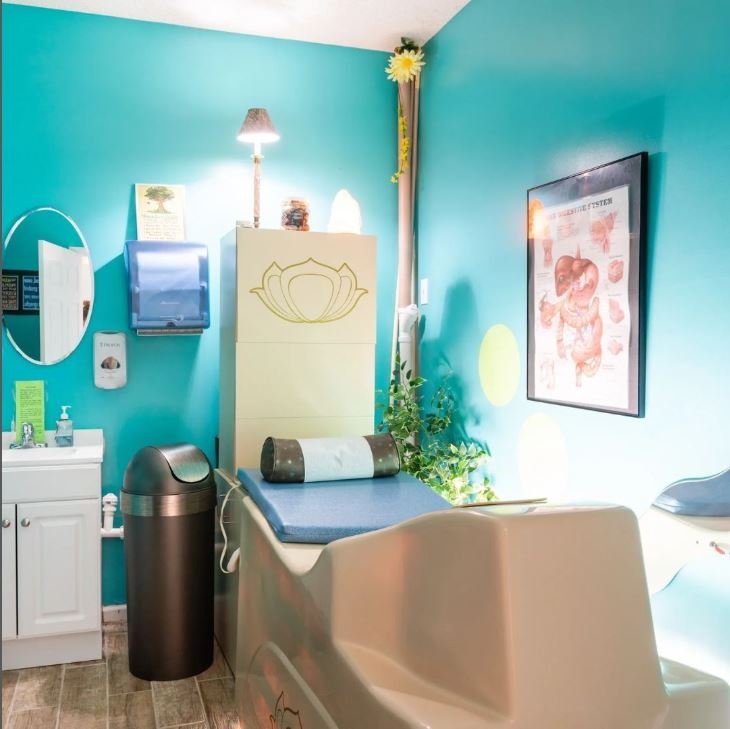 Sacred Waters treatment room prepared for holistic colon hydrotherapy and wellness sessions, featuring a calm, private environment designed for digestive health, relaxation, detox support, and therapeutic healing.
