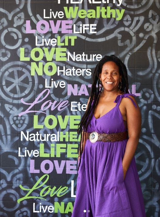 Sister Nilajah, founder of Wadada Healthy Market & Juice Bar, pictured as the visionary behind Atlanta’s first Black-woman-owned vegan grocery store and juice bar, rooted in wellness, culture, and community empowerment.