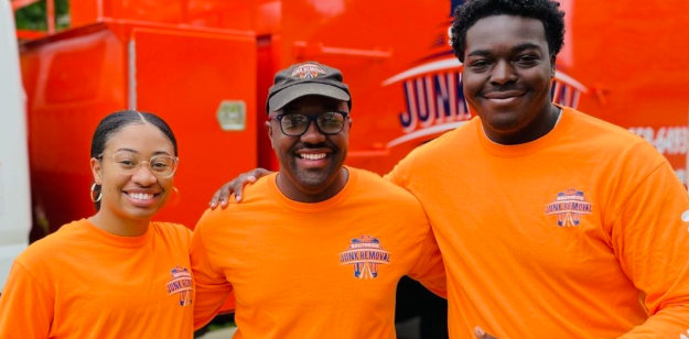 Southside Junk Removal team pictured on the job, representing a friendly, professional crew committed to dependable service, efficient cleanup, and respectful customer care.