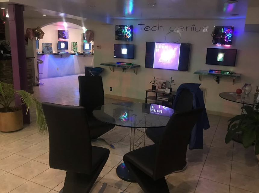 nterior of Tech Genius ATL showcasing a professional technology workspace dedicated to computer diagnostics, repairs, and custom technical solutions.