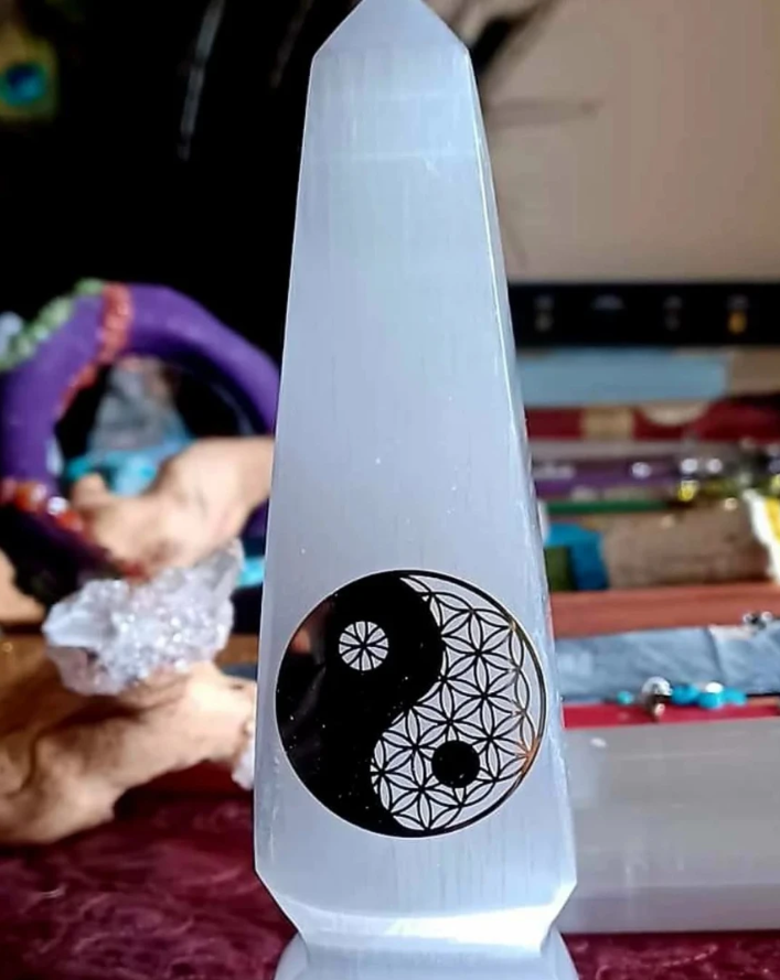 Selenite obelisk offered by A Spiritual Heart by Sandra and Jerry, featured as a powerful purification crystal used for clearing negative energy, enhancing spiritual connection, and uplifting meditation spaces.