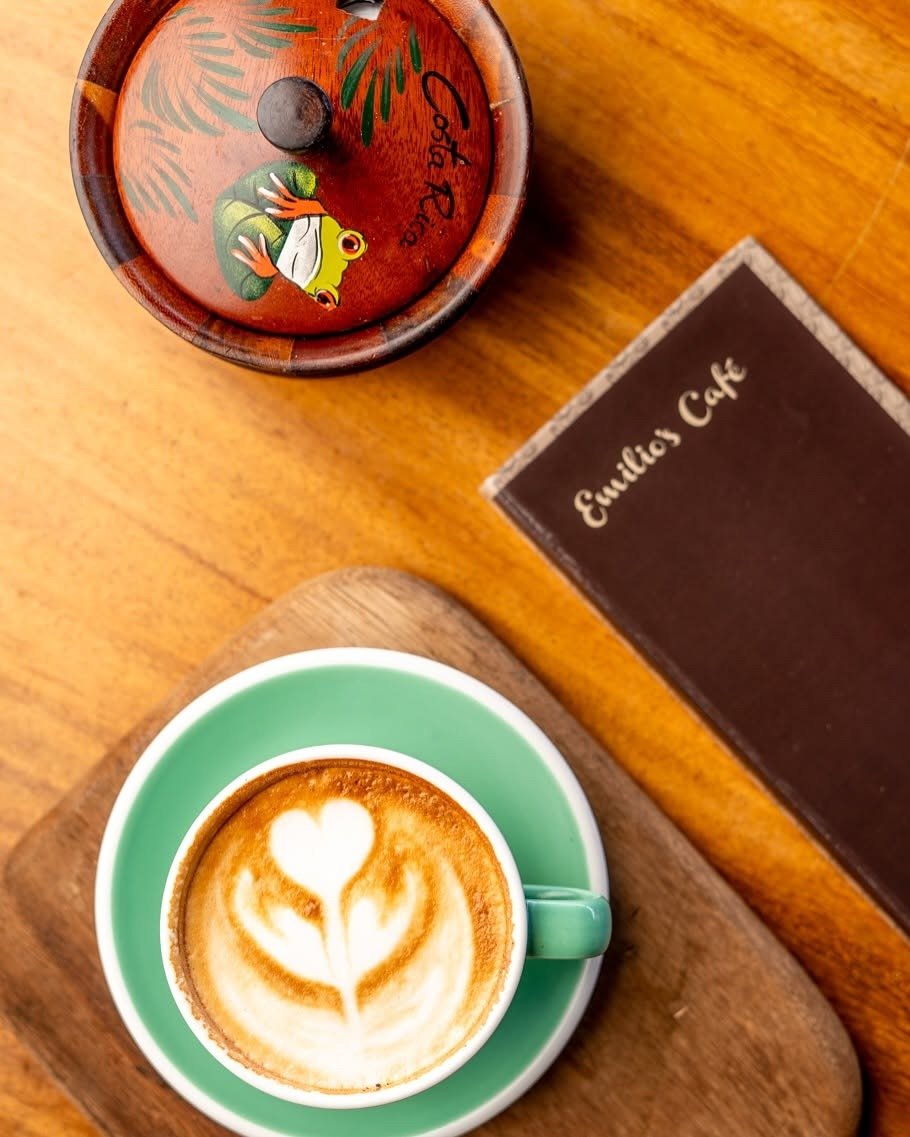 Costa Rican Latte Art with Cafe Menu on Wooden Table – Emilios Cafe Manuel Antonio Costa Rica